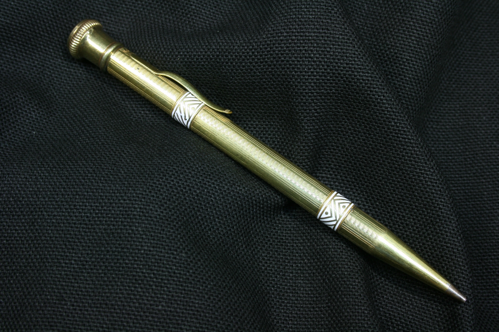 Antiques - GOLD PLATED PENCIL. WHITE ENAMEL.