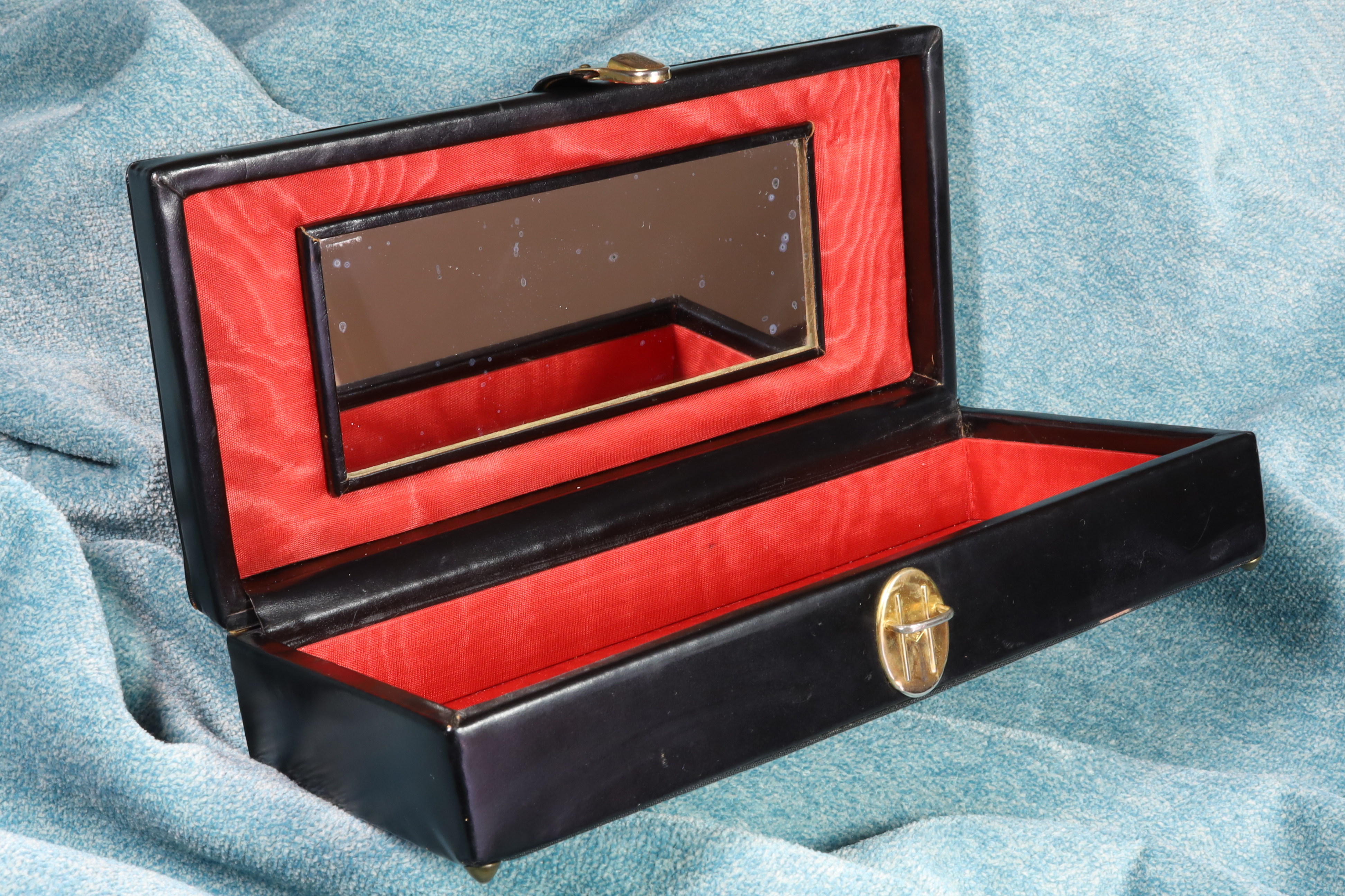 Antiques of black rectangular jewelry box with mirror faux leather