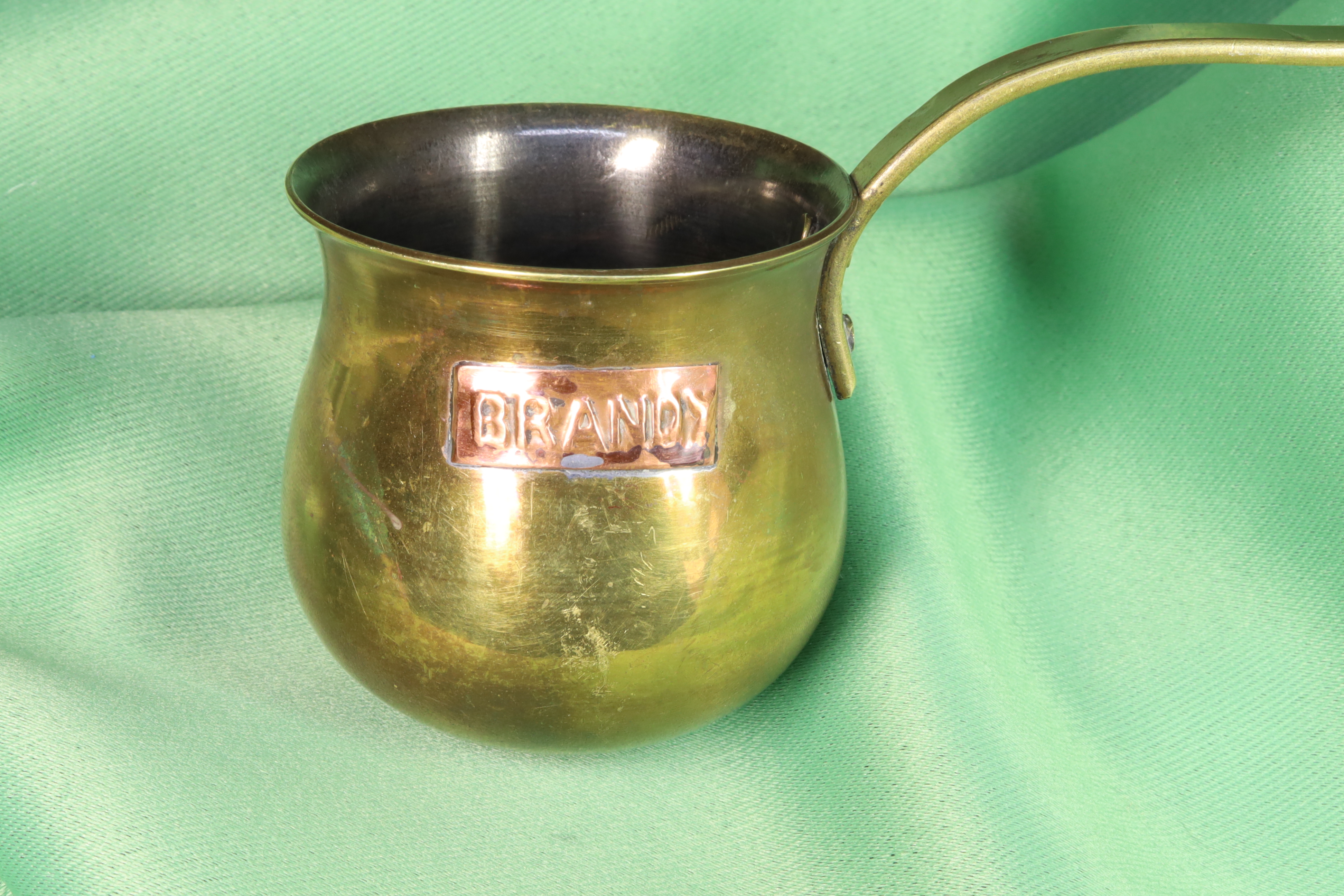Antiguedades de small brandy measuring ladle