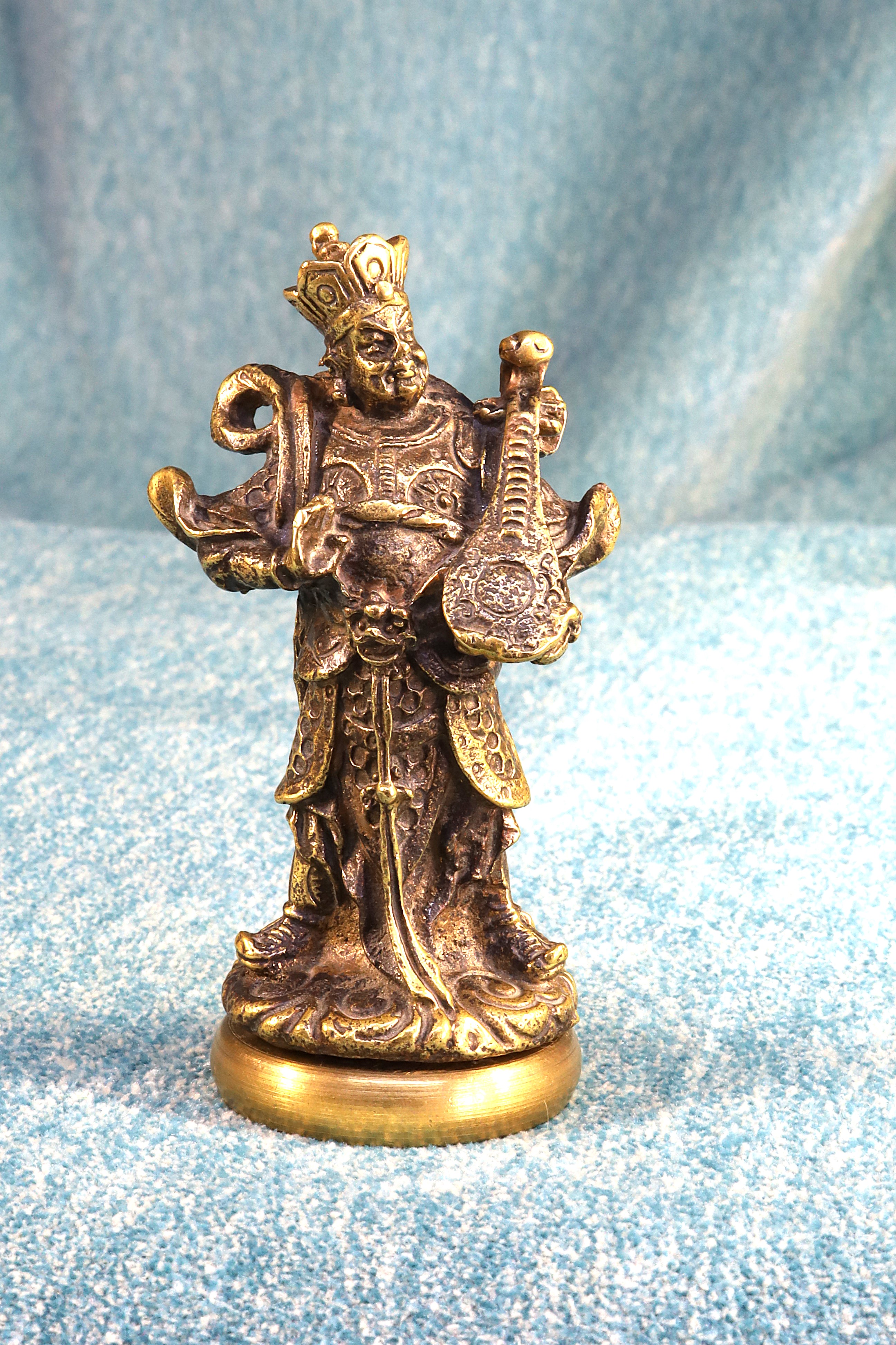 Antiques of chinese god sculpture with musical pipe reproduction